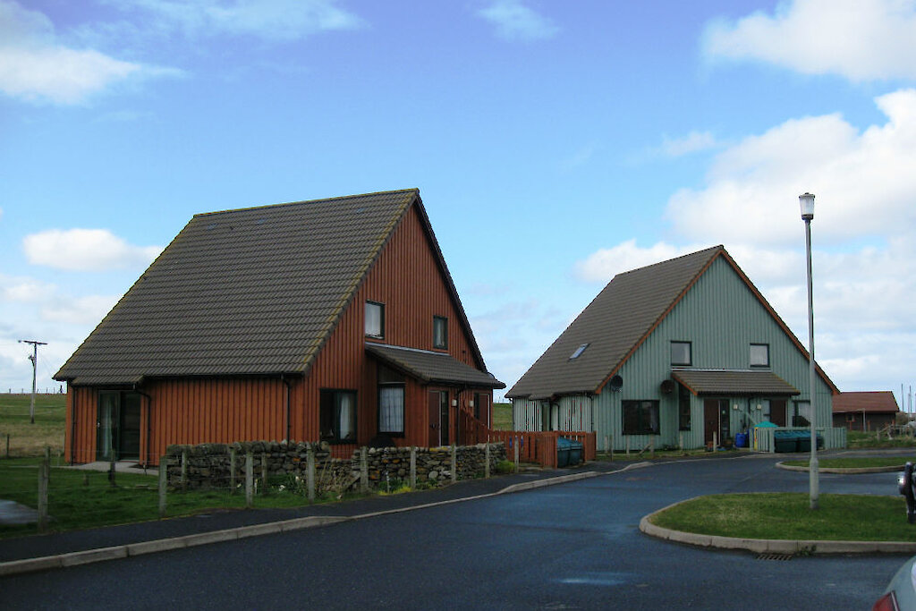 Gostagert, Sandness