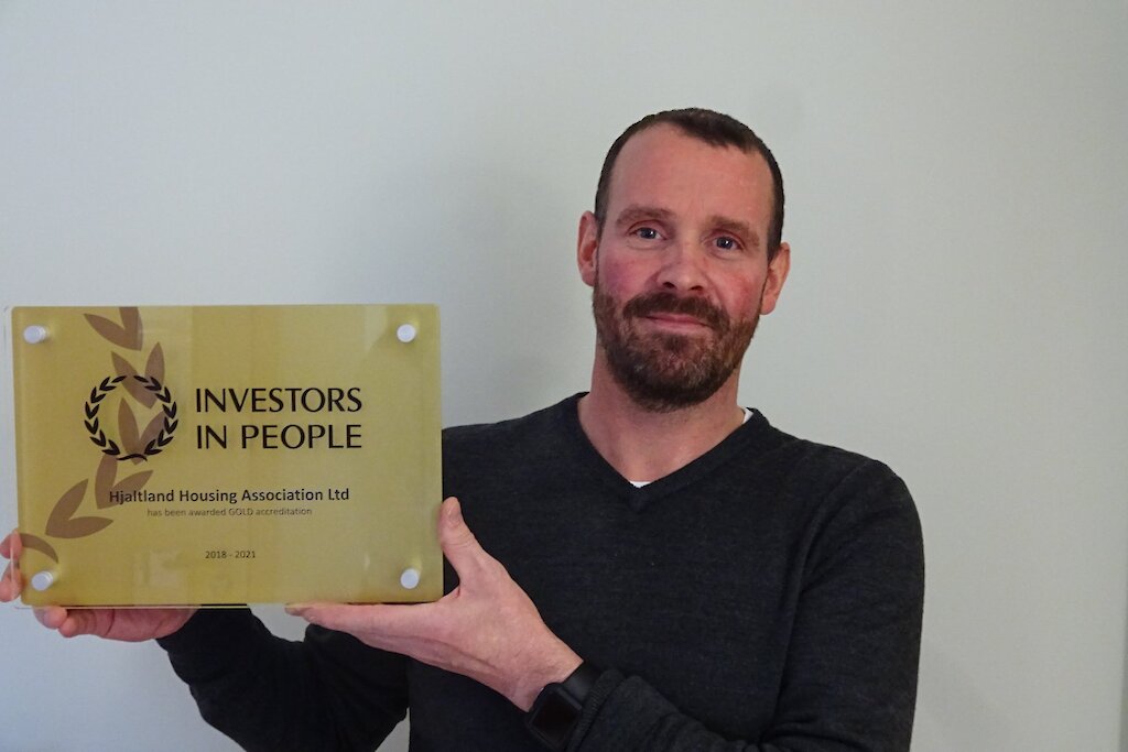 Newest member of staff Jason Montgomery with the Gold Accreditation award